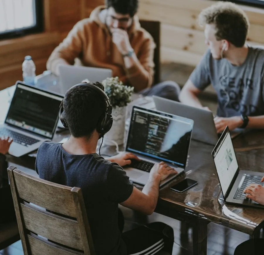 A group of colleagues collaborating around a table
